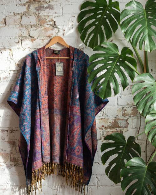 poncho-mit-kapuze-rosa-tuerkis